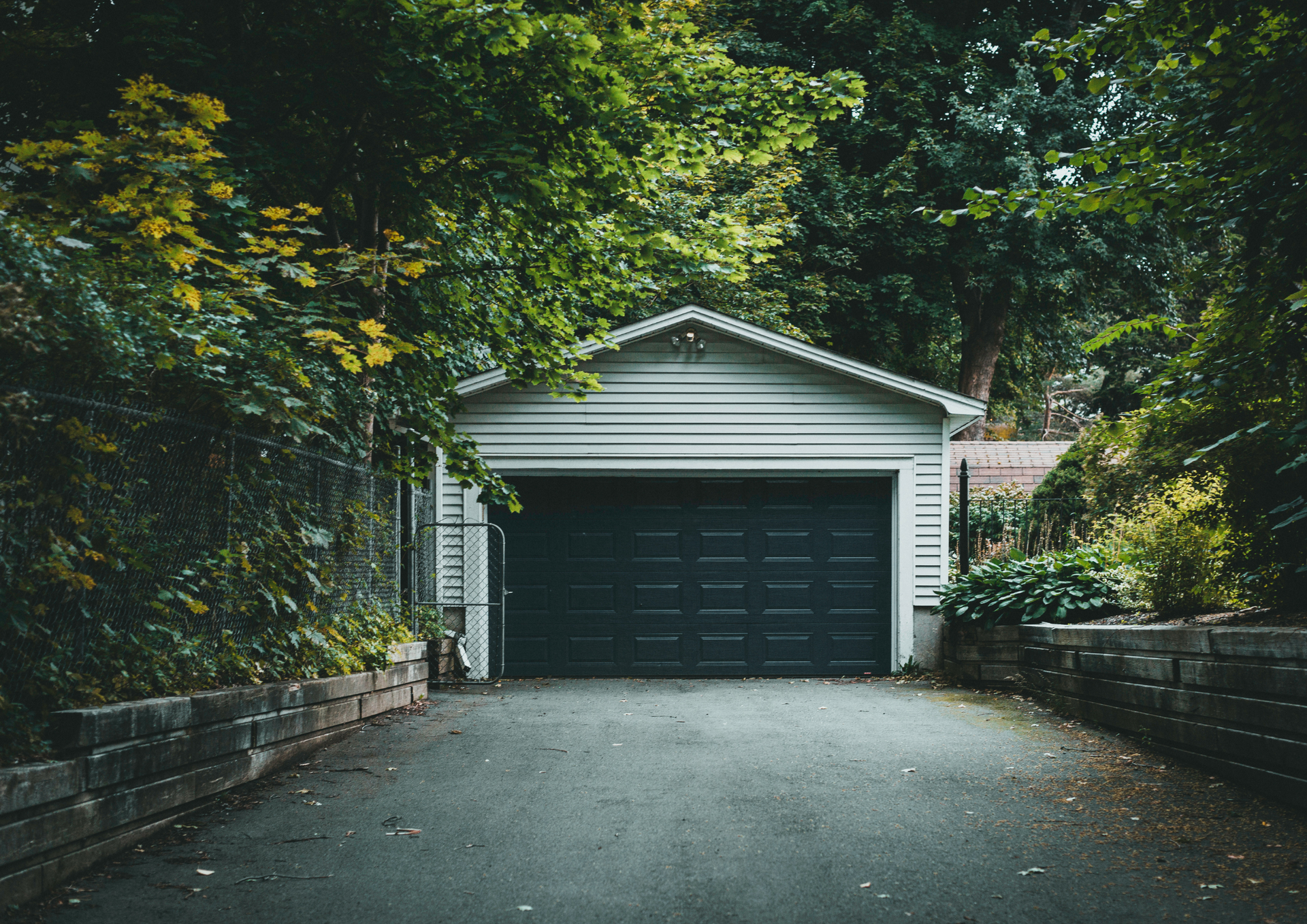 Garage Repair Guide for Worn Rollers and Tracks at Your Property